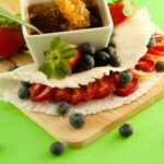 Tapioca com frutas vermelhas e mel